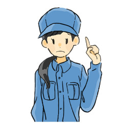 青い作業着の女性　人差し指を立てる