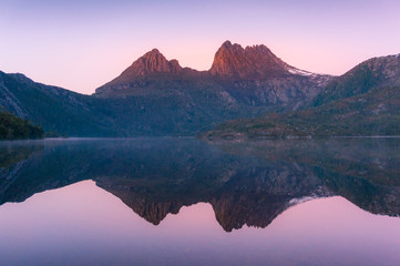 Cradle Mountain reflected in lake Dove at sunrise