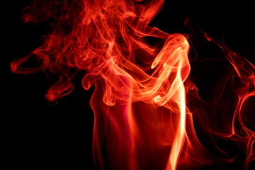 Red smoke on black background