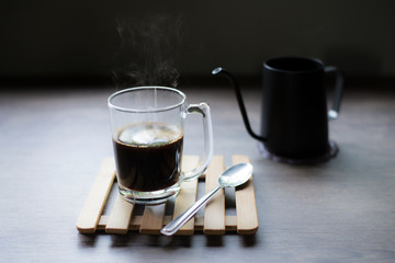 Hot black coffee, Fragrant and having light from window, Close-up.