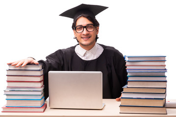 Young handsome student isolated on white 