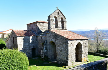 Fototapeta na wymiar Visigothic pre Romanesque Landmark. Santa Comba de Bande medieval church, Ourense, Spain.