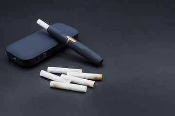 The new technology cigarette, hybrid cigarette, heatsticks, tobacco, new device