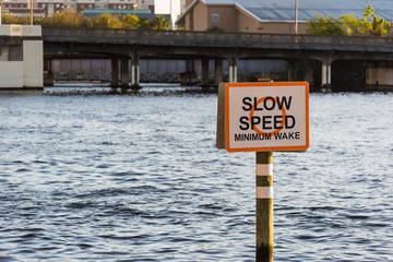 Slow speed sign in Hillsborough river in Tampa