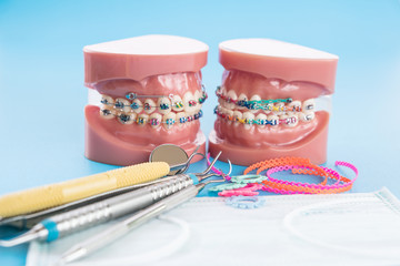 orthodontic model and dentist tool - demonstration teeth model of varities of orthodontic bracket or brace