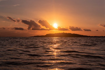 Sunset at the sea, dramatic sky, indonesia