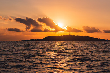 Sunset at the sea, dramatic sky, indonesia