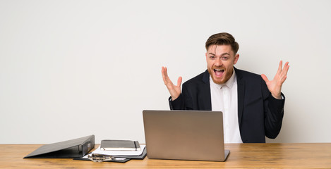 Businessman in a office smiling a lot