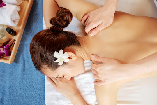 Woman enjoying back massag