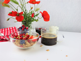 Breakfast served with coffee, cereals and fruits.