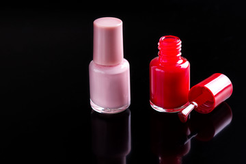 Nail polish on black background