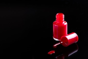 Nail polish on black background