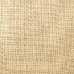 Fototapeta na wymiar Hessian sackcloth woven texture pattern background in light yellow gold brown color tone