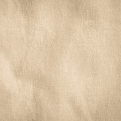 Fototapeta na wymiar Hessian sackcloth woven texture pattern background in light creme yellow beige color earth tone