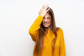 Young woman with yellow over isolated white wall having doubts with confuse face expression