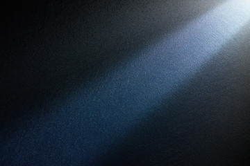 Light beam of light on a dark background.