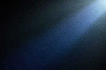 Light beam of light on a dark background.