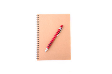 Brown Note or diary book with red pen isolated on white background.