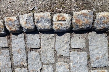 close up detail of cobblestone walkway curbstones