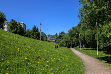 Alternative energy. Lampposts with windmills and solar pannels. Park. Moscow.	