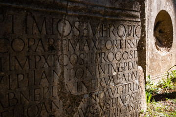 Stone inscription in ancient Roman ruin in Cuicul, Djemila, Algeria