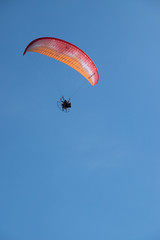 Parasailing over Las Flores Beach, on a very hot day during the summer at Maldonado, Uruguay.