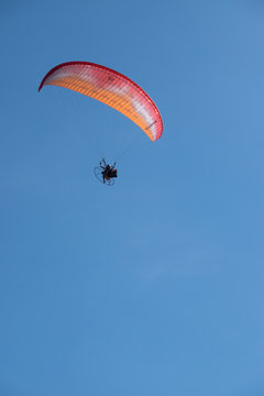 Parasailing over Las Flores Beach, on a very hot day during the summer at Maldonado, Uruguay.