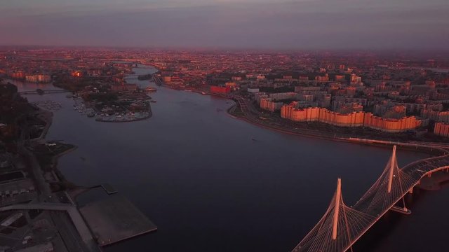 aerial sunset view cable Bridge ZSD road car rooftops zenit arena water Saint Petersburg Russia
