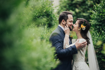 Pretty bride and stylish groom celebrating their marriage.