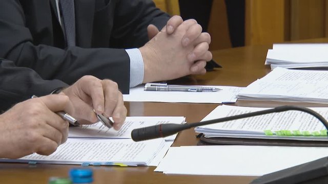 Sign important information. Signing contracts at a business meeting. Important documents.