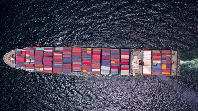 Cargo ship carries the container heading to the port It is the important part of imported and exported economy and export products worldwide