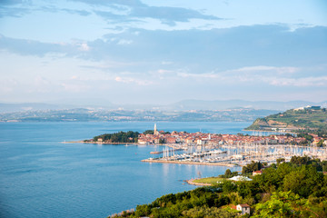 Beautiful amazing city scenery with boats in the bay in Izola, Slovenia. Wonderful exciting places. (vacation, rest - concept)