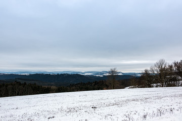 Winter landscape with ice and a field of snow