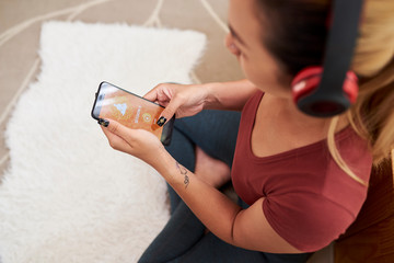 Woman lessening to music for meditation