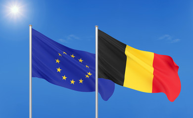 European Union vs Belgium. Thick colored silky flags of European Union and Belgium. 3D illustration on sky background. - Illustration