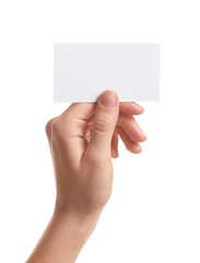 Fototapeta premium Woman holding empty business card isolated on white, closeup