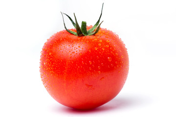 One round red ripe tomato on white isolate background,