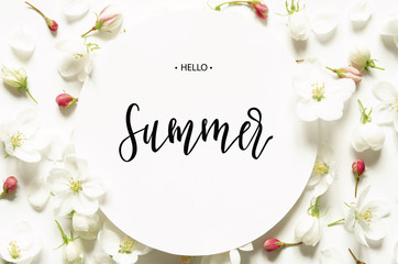 Inscription Hello Summer. White fresh flowers. Top view. - image