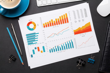 Office workplace table with reports