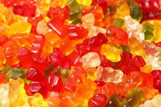 Many delicious colorful jelly bears as background, closeup
