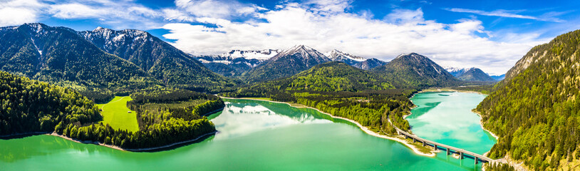 Amazing bridge over accumulation lake Sylvenstein, upper Bavaria. Aerial view. May, Germany