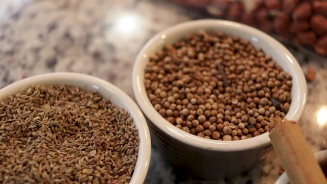 Top view, Close-up. Cloves, pepper grains and cinnamon on the table. Tipical ingredients of original Mole from Puebla, Mexico. North America. Cooking Traditional recipe