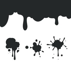 blots and drips of black paint on a white background