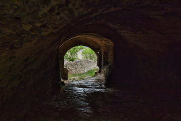 Fototapeta na wymiar a tunnel in an old castle ruin