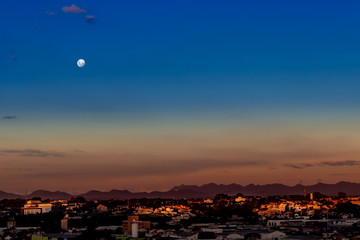 Moon over the city