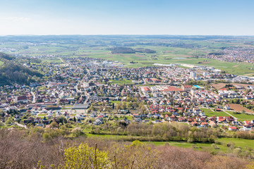 Little village in the middle of the german countryside with hills, forests, fields and meadows