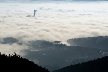 Clouds inversion in the town during autumn morning from mountains. Slovakia