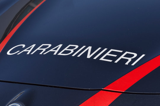 Carabinieri - it's wrote on the front hood of the service car of the first force of the Italian army