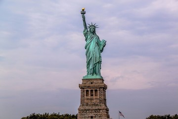 Fototapeta na wymiar Nice view on isolated Statue of Liberty New York. Beautiful backgrounds.
