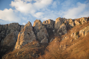 Fototapeta premium Demerdzhi mountain range in the rays of the setting sun. Autonomous Republic of Crimea